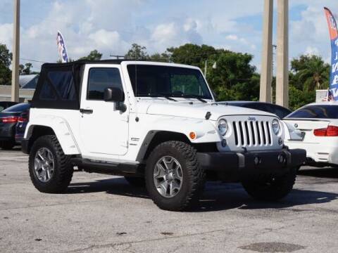 2014 Jeep Wrangler for sale at Sunny Florida Cars in Bradenton FL