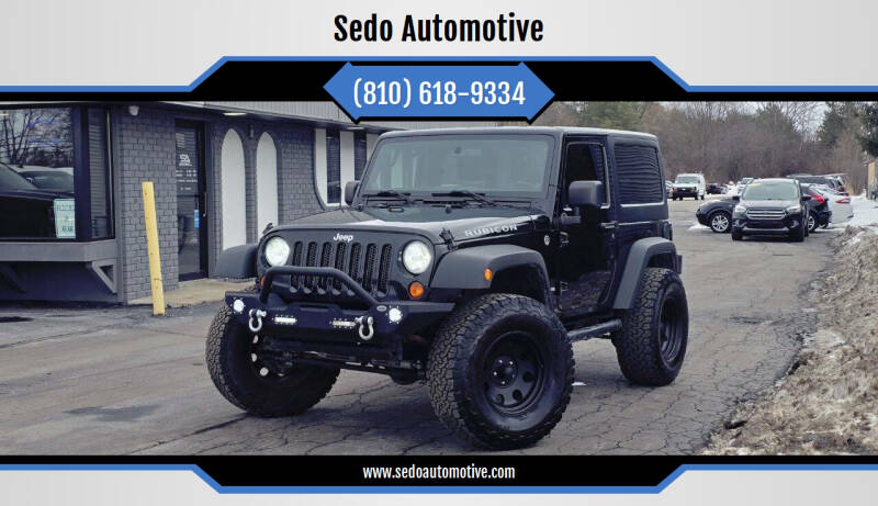 2012 Jeep Wrangler for sale at Sedo Automotive in Davison MI