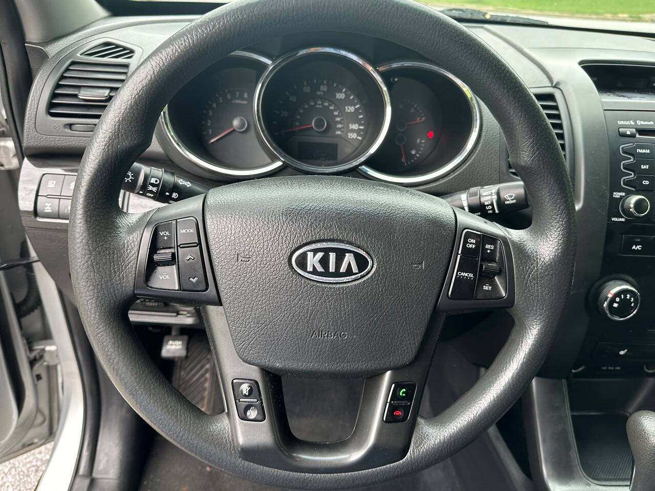 2012 Kia Sorento for sale at SHURE AUTO SALES in Snellville, GA