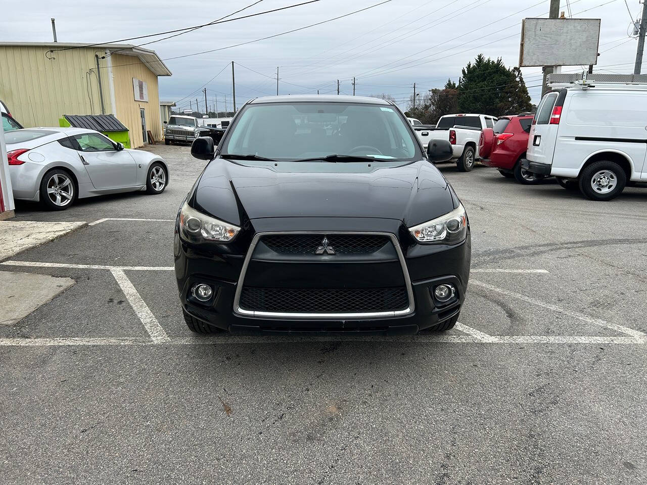 2012 Mitsubishi Outlander Sport for sale at Justin Hughes Auto Group LLC in Douglasville, GA