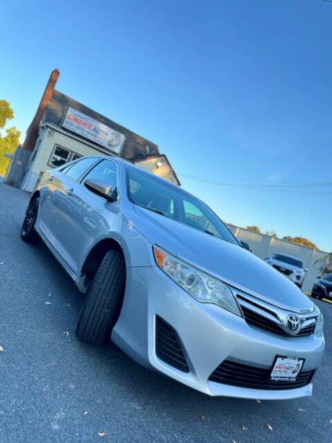 2014 Toyota Camry for sale at Singh's Auto Sales in Jessup, MD