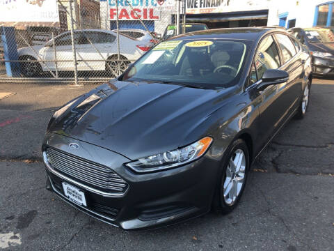 2015 Ford Fusion for sale at DEALS ON WHEELS in Newark NJ