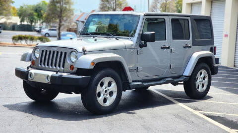 2013 Jeep Wrangler Unlimited for sale at Maxicars Auto Sales in West Park FL