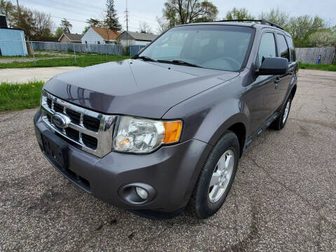 2010 Ford Escape for sale at TopLine Auto in Burton MI