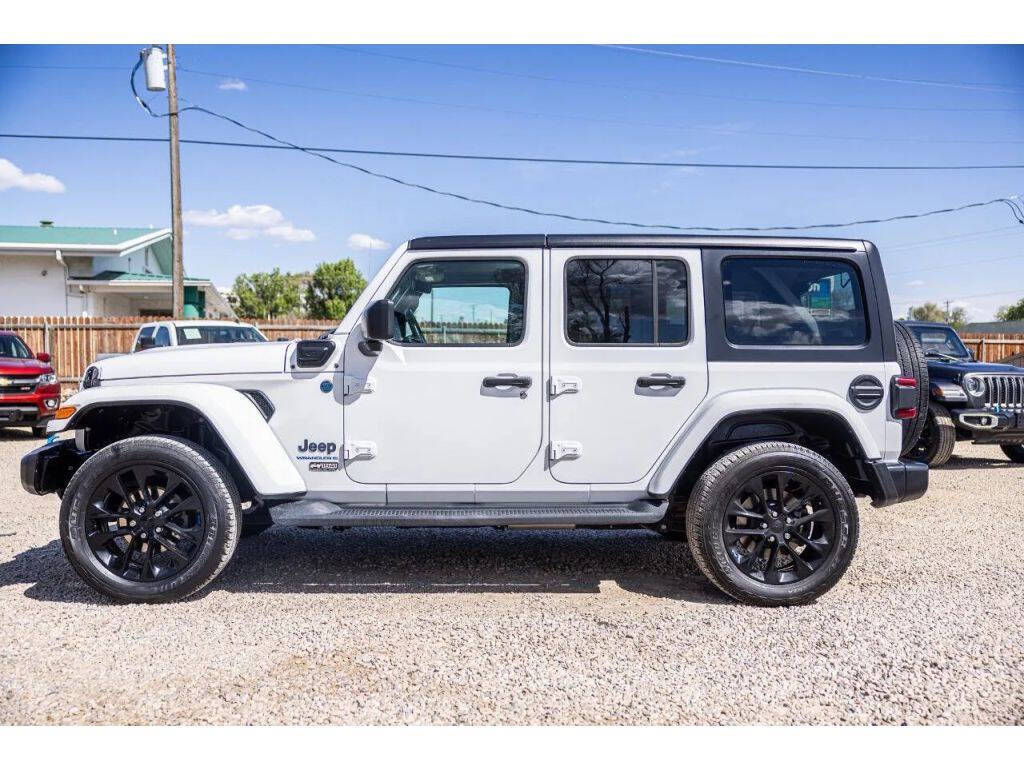 2023 Jeep Wrangler Sahara 4xe 4x4 4dr SUV - White exterior view 4