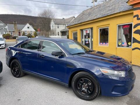 2014 Ford Taurus for sale at KIM CESARE AUTO SALES in Pen Argyl PA