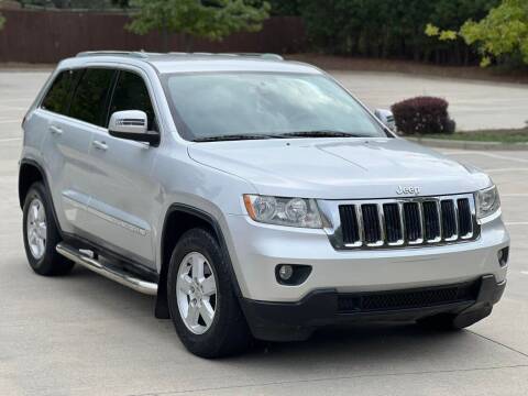 2011 Jeep Grand Cherokee for sale at Two Brothers Auto Sales in Loganville GA