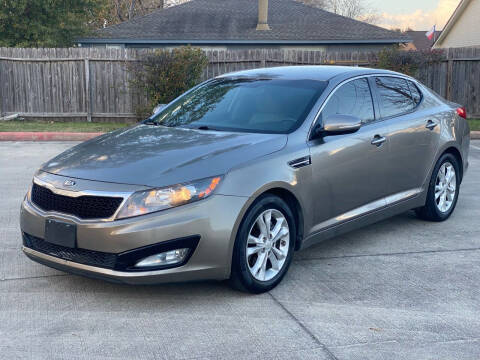 2013 Kia Optima for sale at KM Motors LLC in Houston TX