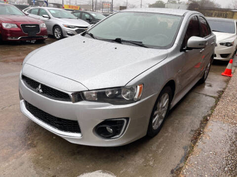 2016 Mitsubishi Lancer for sale at Sam's Auto Sales in Houston TX