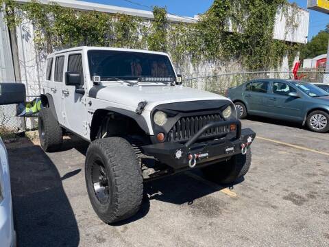 2011 Jeep Wrangler Unlimited for sale at 4 Girls Auto Sales in Houston TX