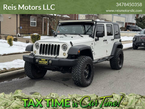 2009 Jeep Wrangler Unlimited for sale at Reis Motors LLC in Lawrence NY