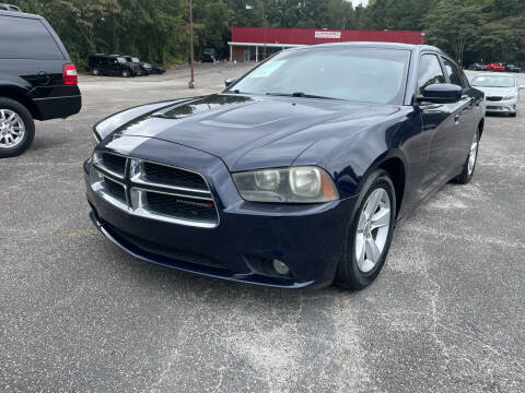 2013 Dodge Charger for sale at Certified Motors LLC in Mableton GA