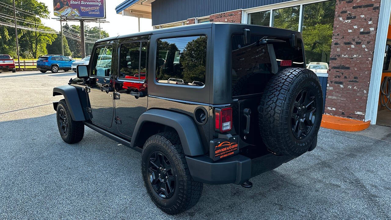 2018 Jeep Wrangler JK Unlimited for sale at North Ridge Auto Center LLC in Madison, OH