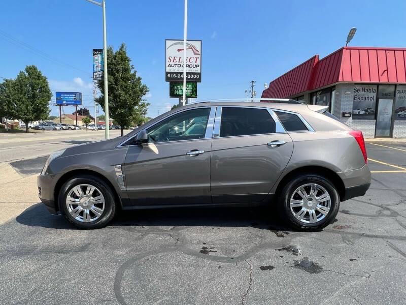 2012 Cadillac SRX for sale at Select Auto Group in Wyoming MI