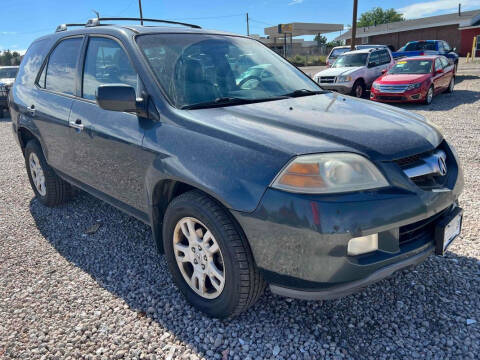 2005 Acura MDX for sale at BERKENKOTTER MOTORS in Brighton CO