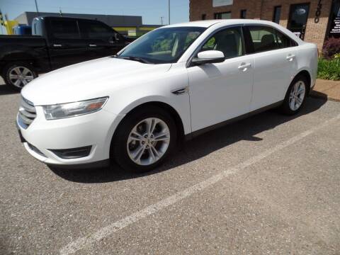 2014 Ford Taurus for sale at Flywheel Motors, llc. in Olive Branch MS
