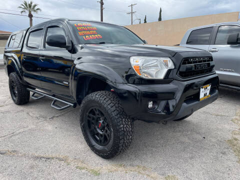 2015 Toyota Tacoma for sale at JR'S AUTO SALES in Pacoima CA