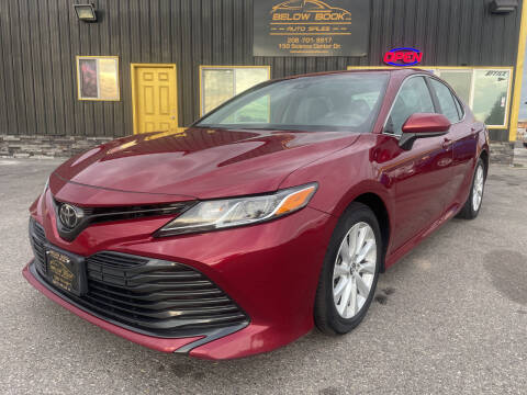 2020 Toyota Camry for sale at BELOW BOOK AUTO SALES in Idaho Falls ID