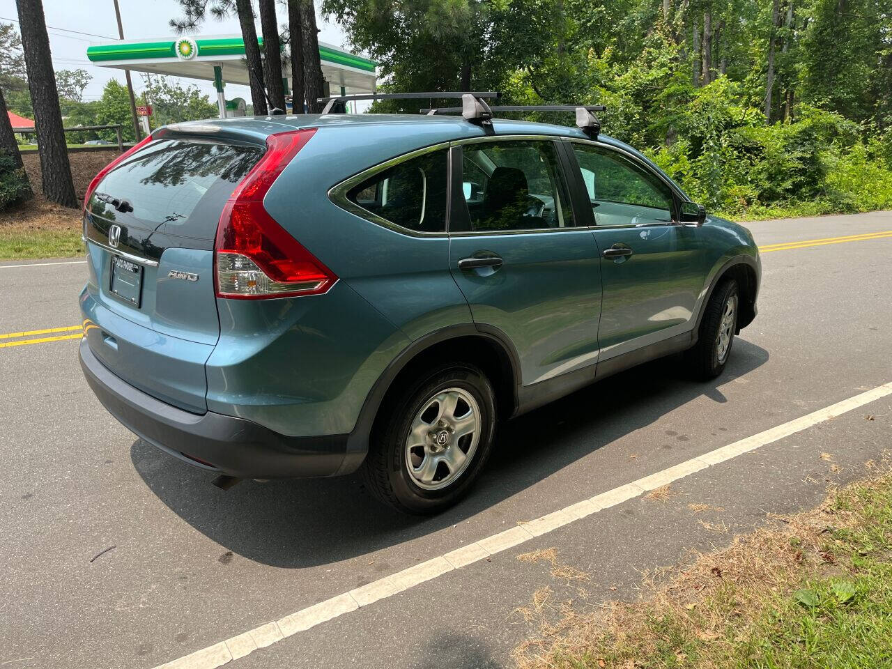 Preowned 2014 HONDA CR-V LX AWD 4dr SUV for sale by The Auto Finders Car Dealership of Durham in Durham, NC
