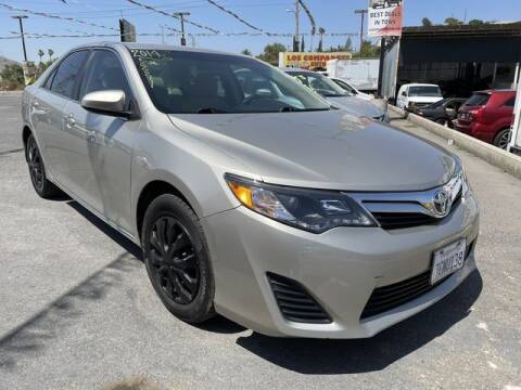 2014 Toyota Camry for sale at Los Compadres Auto Sales in Riverside CA