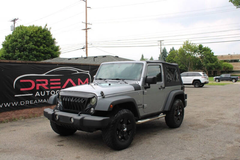 2014 Jeep Wrangler for sale at Dream Auto Group in Shelby Township MI