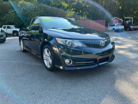 2012 Toyota Camry for sale at Knockout Deals Auto Sales in West Bridgewater MA