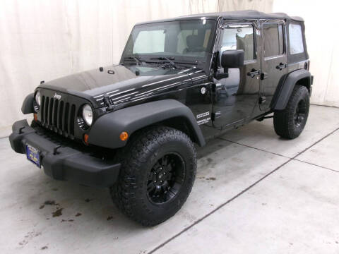 2012 Jeep Wrangler Unlimited for sale at Paquet Auto Sales in Madison OH