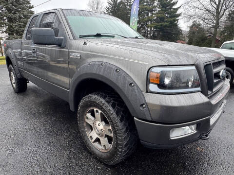 2005 Ford F-150 for sale at DISTINCT AUTO GROUP LLC in Kent OH