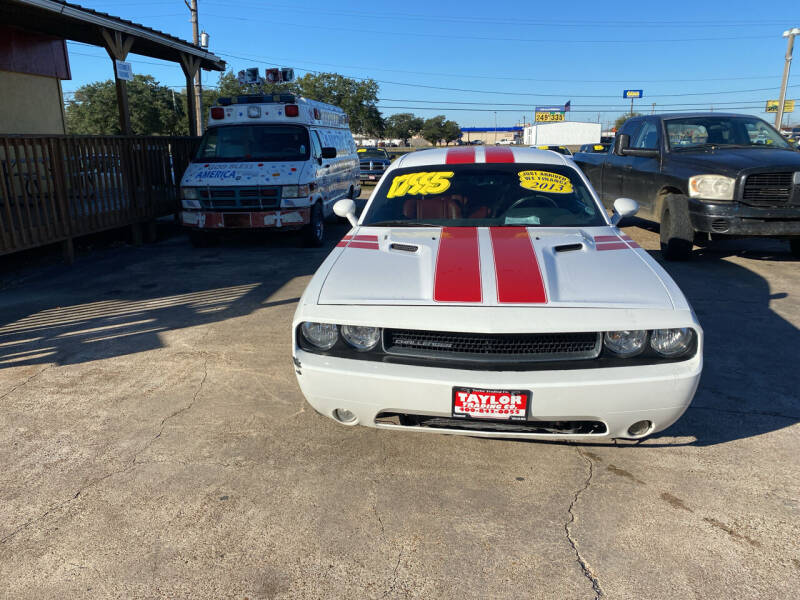 2013 Dodge Challenger for sale at Taylor Trading Co in Beaumont TX