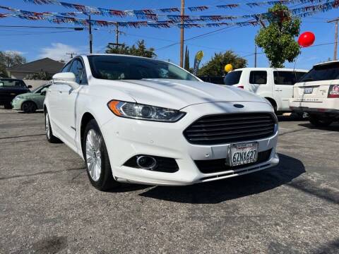 2013 Ford Fusion Hybrid for sale at Tristar Motors in Bell CA