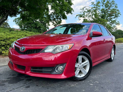 2014 Toyota Camry for sale at Duluth Autos and Trucks in Duluth GA