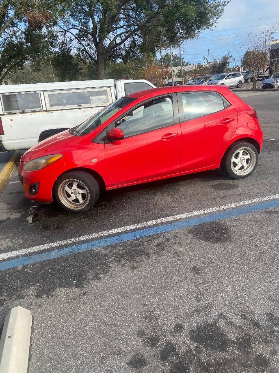 2012 Mazda Mazda2 for sale at AFFORDABLE IMPORT AUTO INC in Longwood, FL