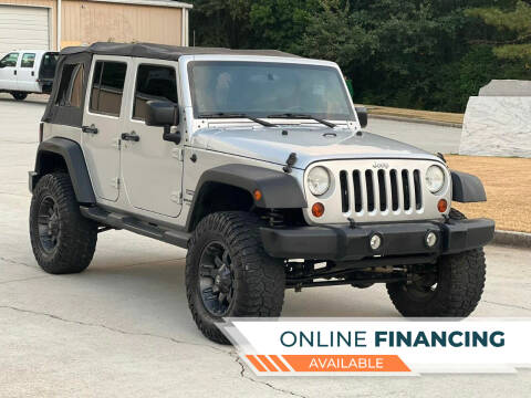 2012 Jeep Wrangler Unlimited for sale at Two Brothers Auto Sales in Loganville GA