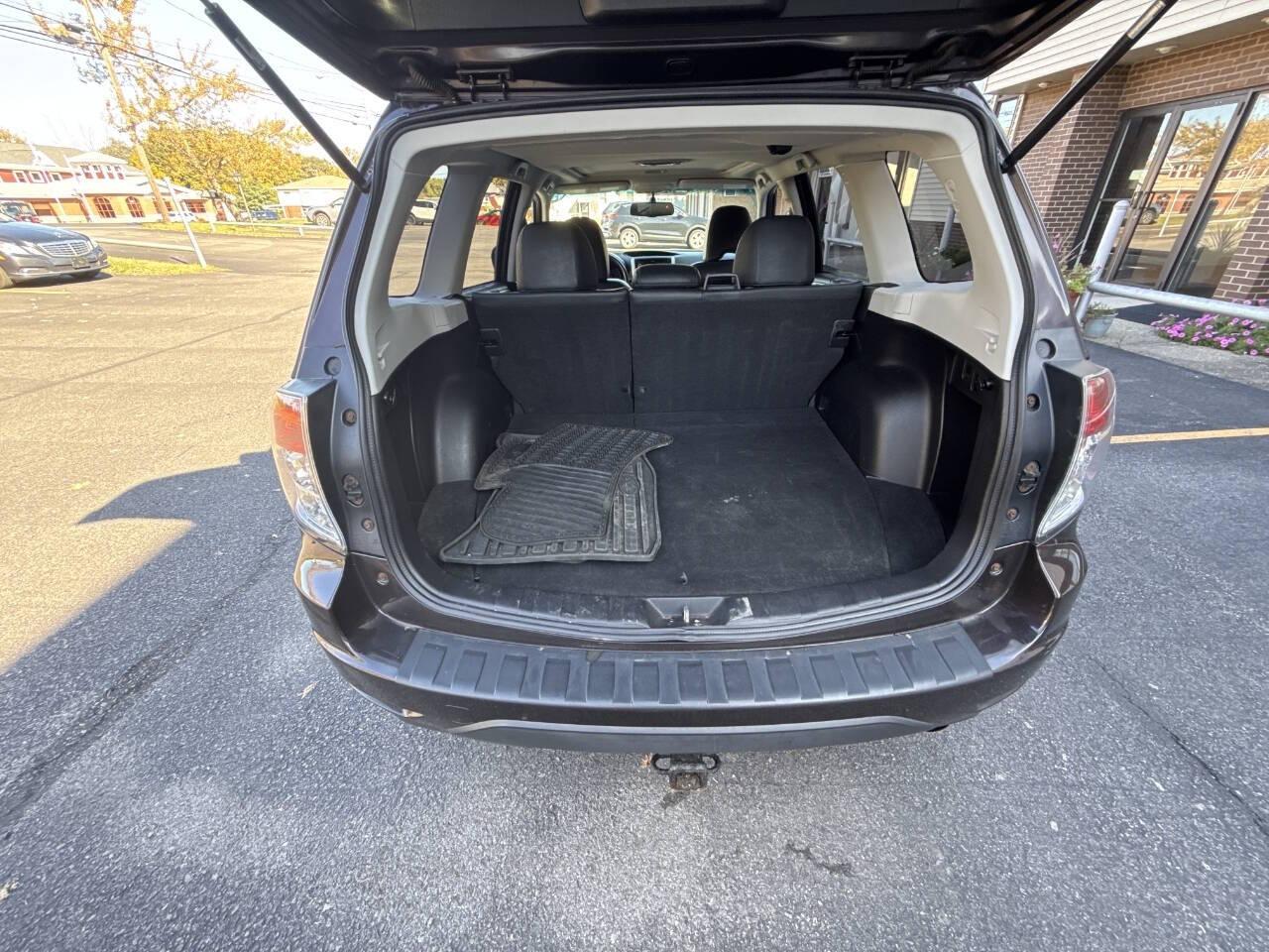 2013 Subaru Forester for sale at Rochester Imports LLC in Webster, NY