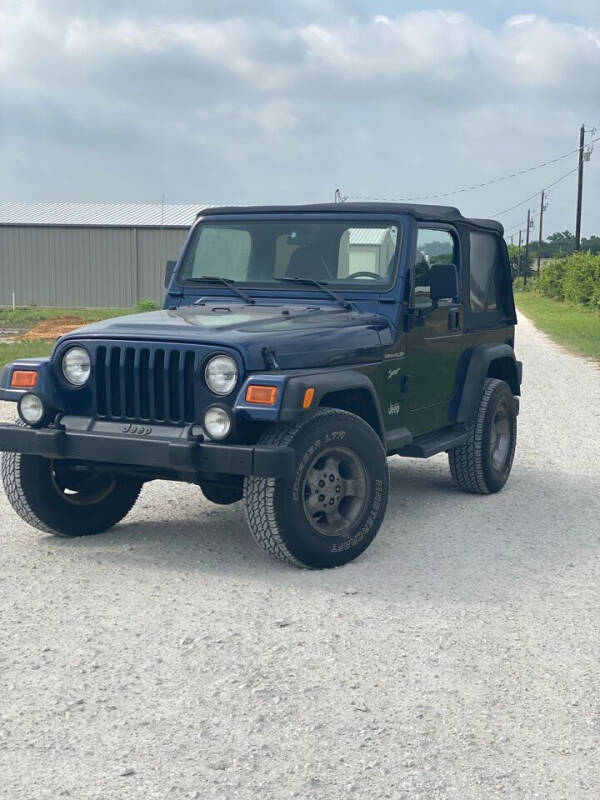 2002 Jeep Wrangler for sale at Andover Auto Group, LLC. in Argyle TX