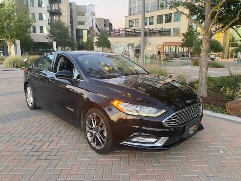 2017 Ford Fusion Hybrid for sale at KAM Motor Sales in Dallas TX