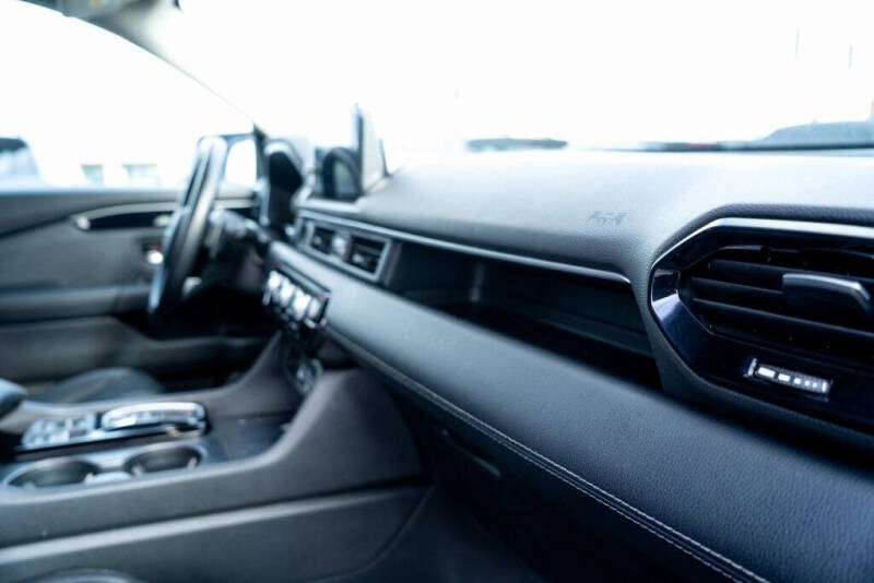 2023 Honda Pilot EX-L w/Rear Captain's Chairs