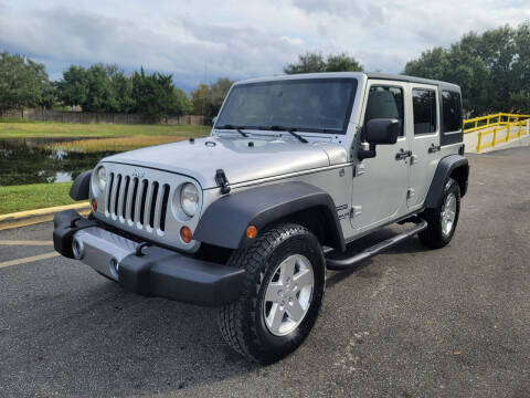 2012 Jeep Wrangler Unlimited for sale at Carcoin Auto Sales in Orlando FL