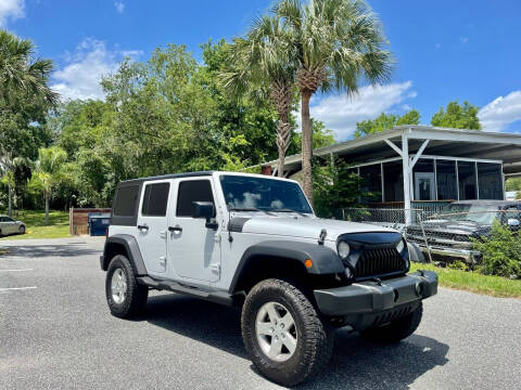 2014 Jeep Wrangler Unlimited for sale at Executive Motor Group in Leesburg FL