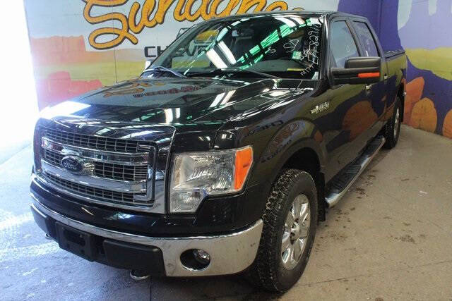 Used 2014 Ford F-150 XLT with VIN 1FTFW1EFXEKF82910 for sale in Grand Ledge, MI