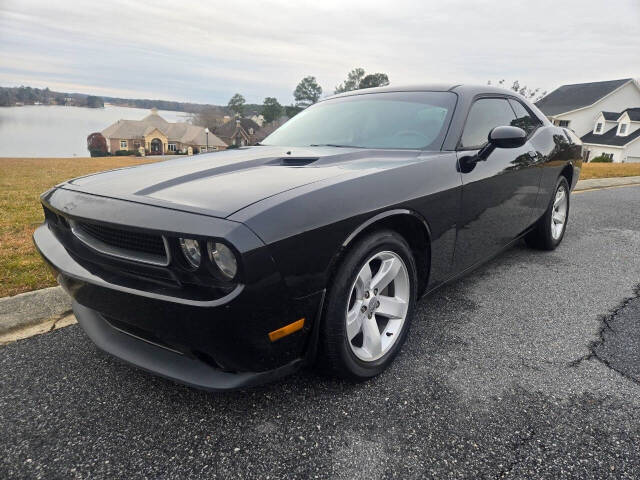 2013 Dodge Challenger for sale at Connected Auto Group in Macon, GA