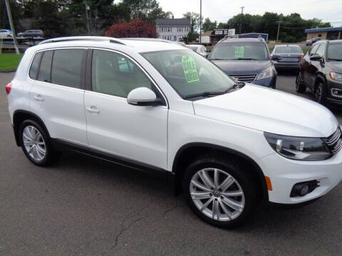 2014 Volkswagen Tiguan for sale at BETTER BUYS AUTO INC in East Windsor CT