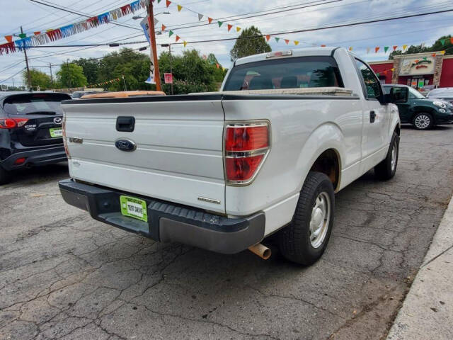 2013 Ford F-150 for sale at DAGO'S AUTO SALES LLC in Dalton, GA