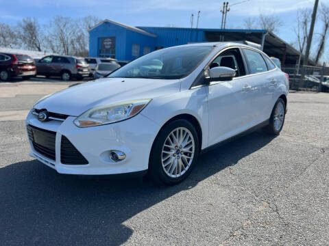 2012 Ford Focus for sale at MGM Auto Group in Framingham MA