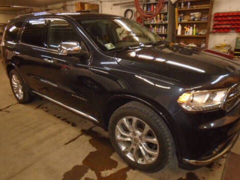 2016 Dodge Durango for sale at SWENSON MOTORS in Gaylord MN