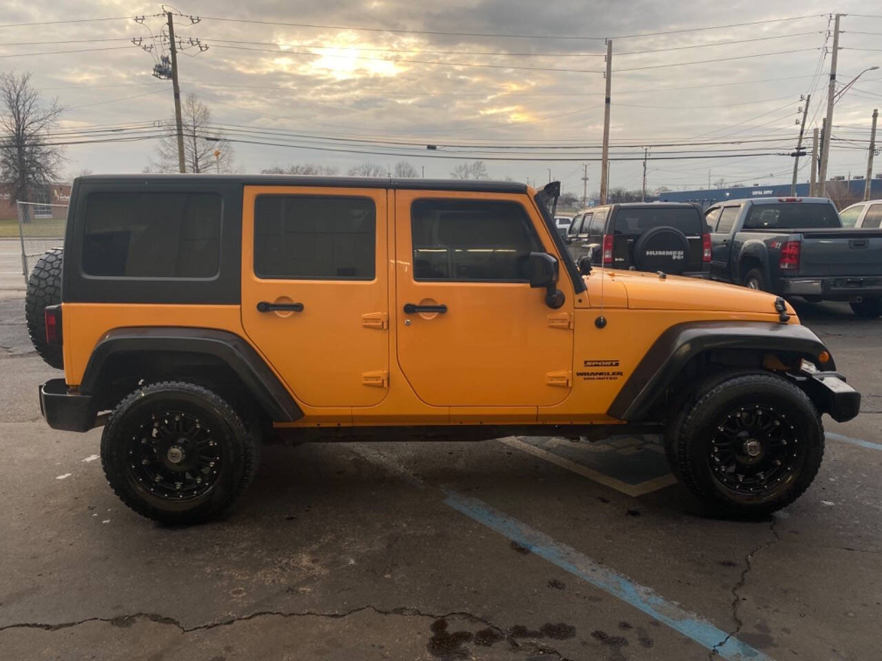 2012 Jeep Wrangler Unlimited for sale at Post Rd Motors in Indianapolis, IN