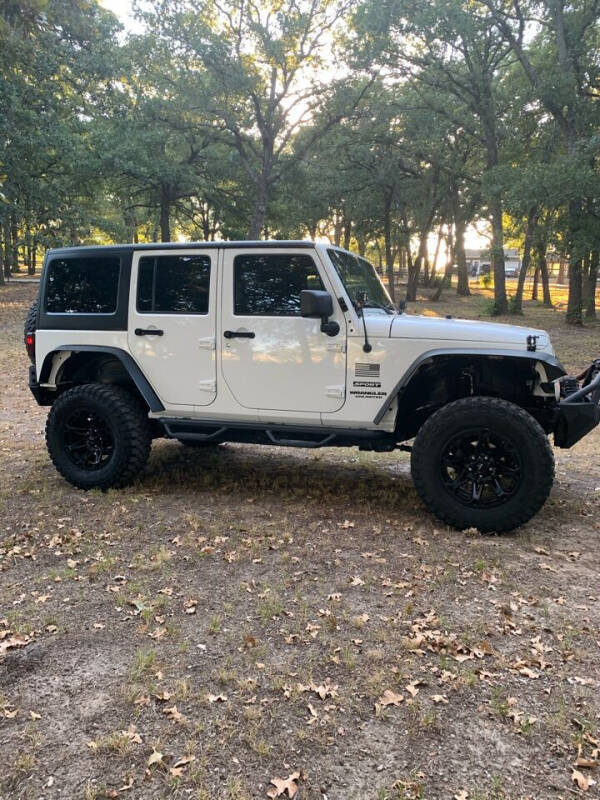 2012 Jeep Wrangler Unlimited for sale at BARROW MOTORS in Campbell TX