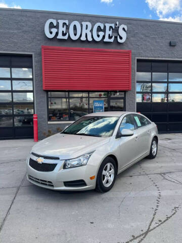 2013 Chevrolet Cruze for sale at George's Used Cars in Brownstown MI