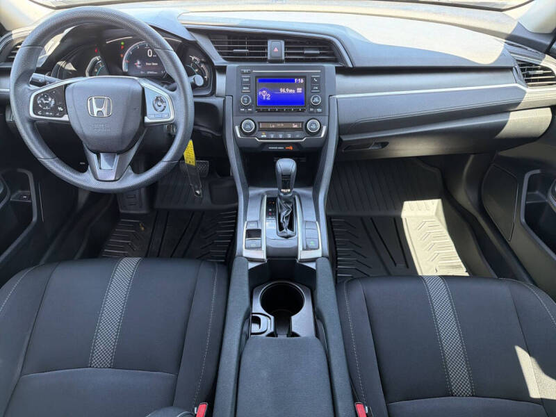 Used 2020 Honda Civic LX with VIN 19XFC2F65LE014688 for sale in Loganville, GA