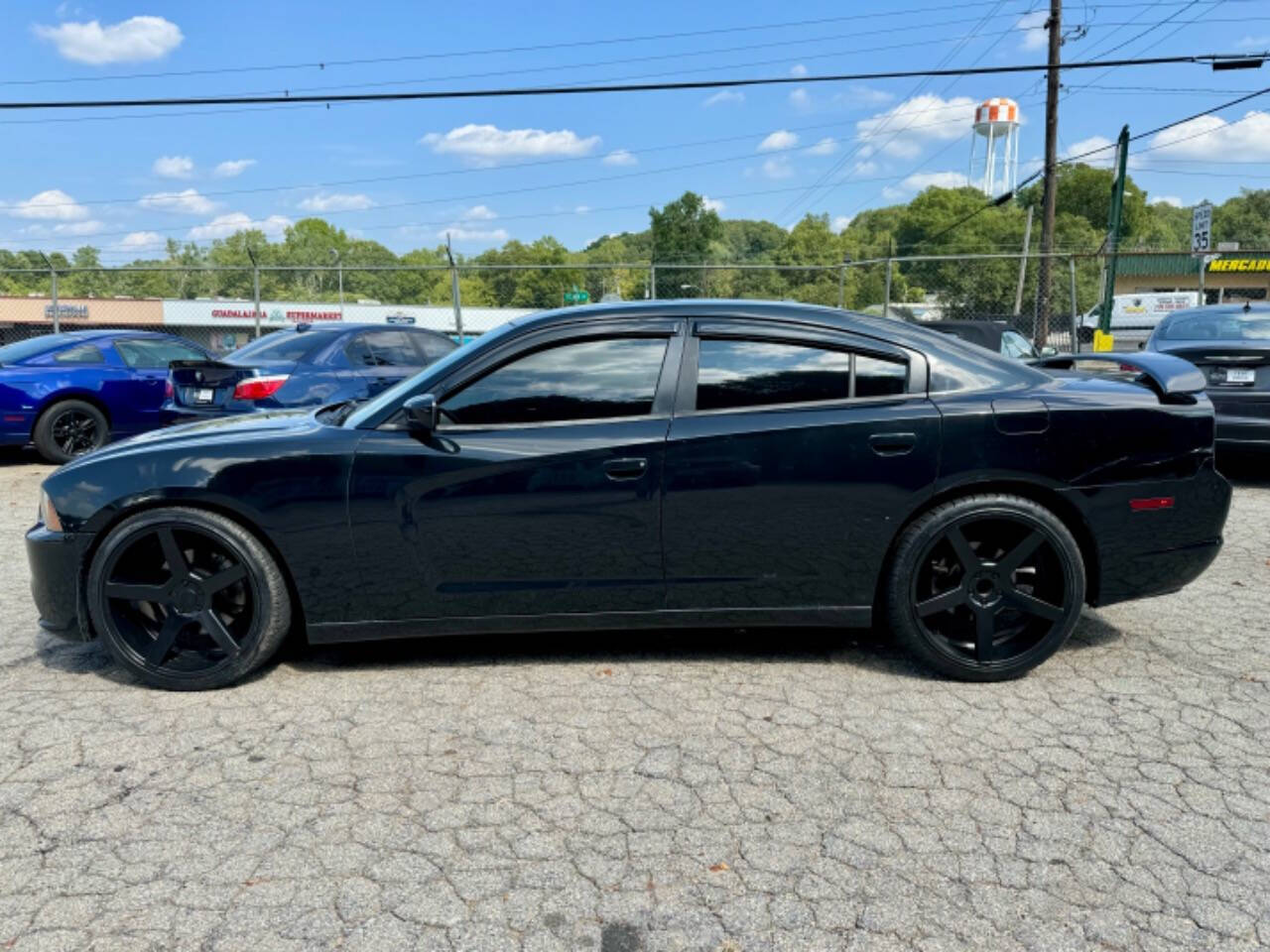 2013 Dodge Charger for sale at ICars Motors LLC in Gainesville, GA